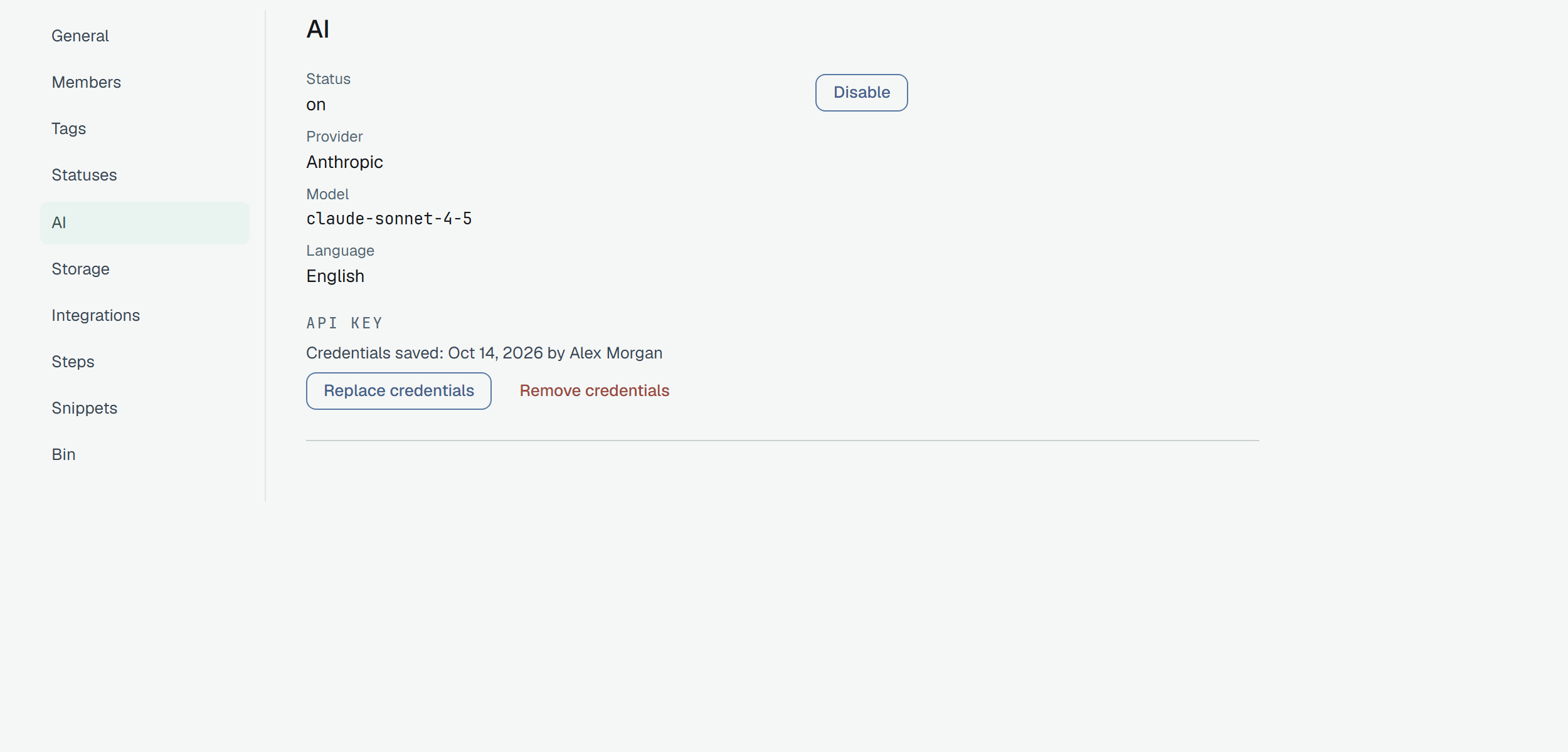 Settings → AI of Webshop after Connect: Status on with a Disable button; Provider Anthropic; Model claude-sonnet-4-5; Language English; API key — Credentials saved with the date, by Alex Morgan — with the buttons Replace credentials and Remove credentials.
