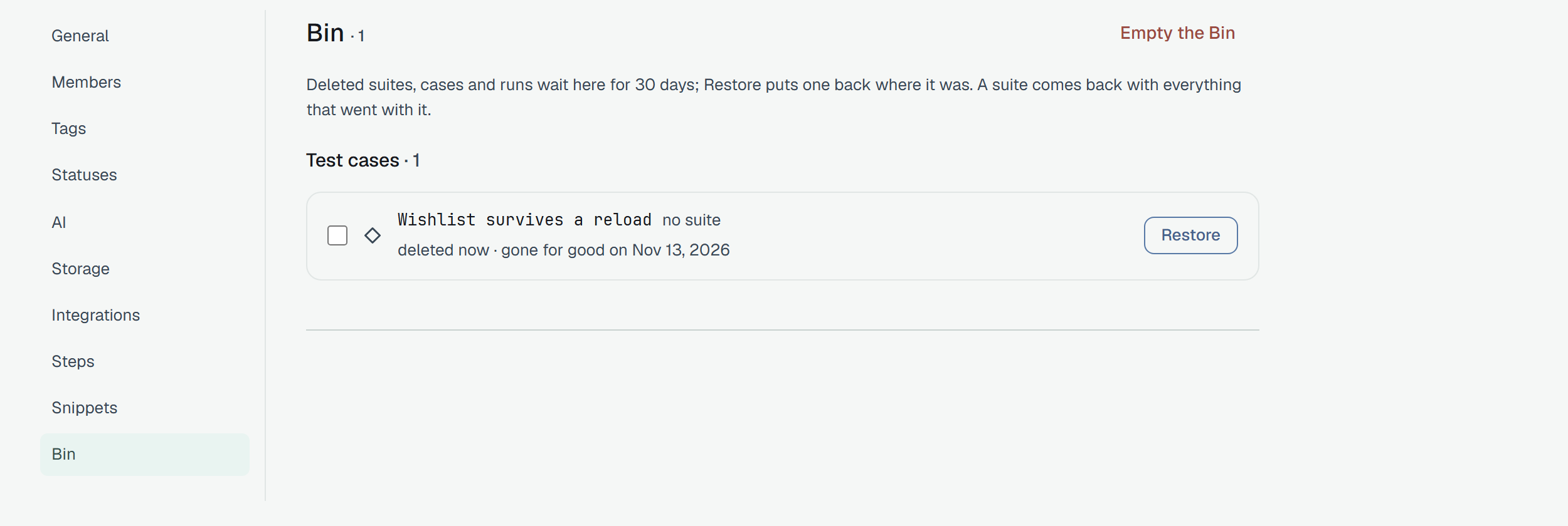 Settings → Bin of Webshop: Bin · 1 and Empty the Bin in red; the line Deleted suites, cases and runs wait here for 30 days; Restore puts one back where it was. A suite comes back with everything that went with it.; the group Test cases · 1 with a row, a box, Wishlist survives a reload, no suite, deleted now · gone for good on a date 30 days later, and a Restore button.